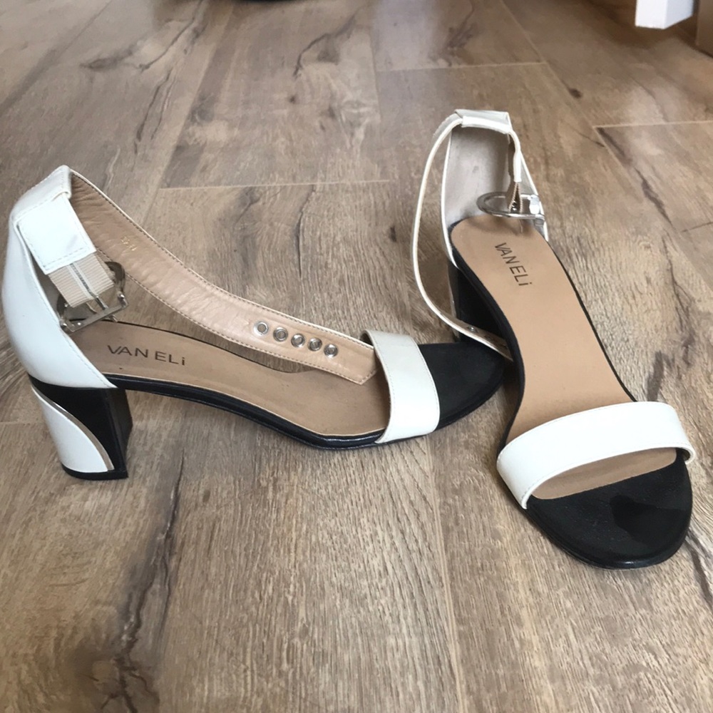 White heels with black accent